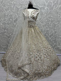 Wonderful Off-White Zirkon Work Net Bridesmaid Lehenga Choli With Dupatta - Zeel Clothing