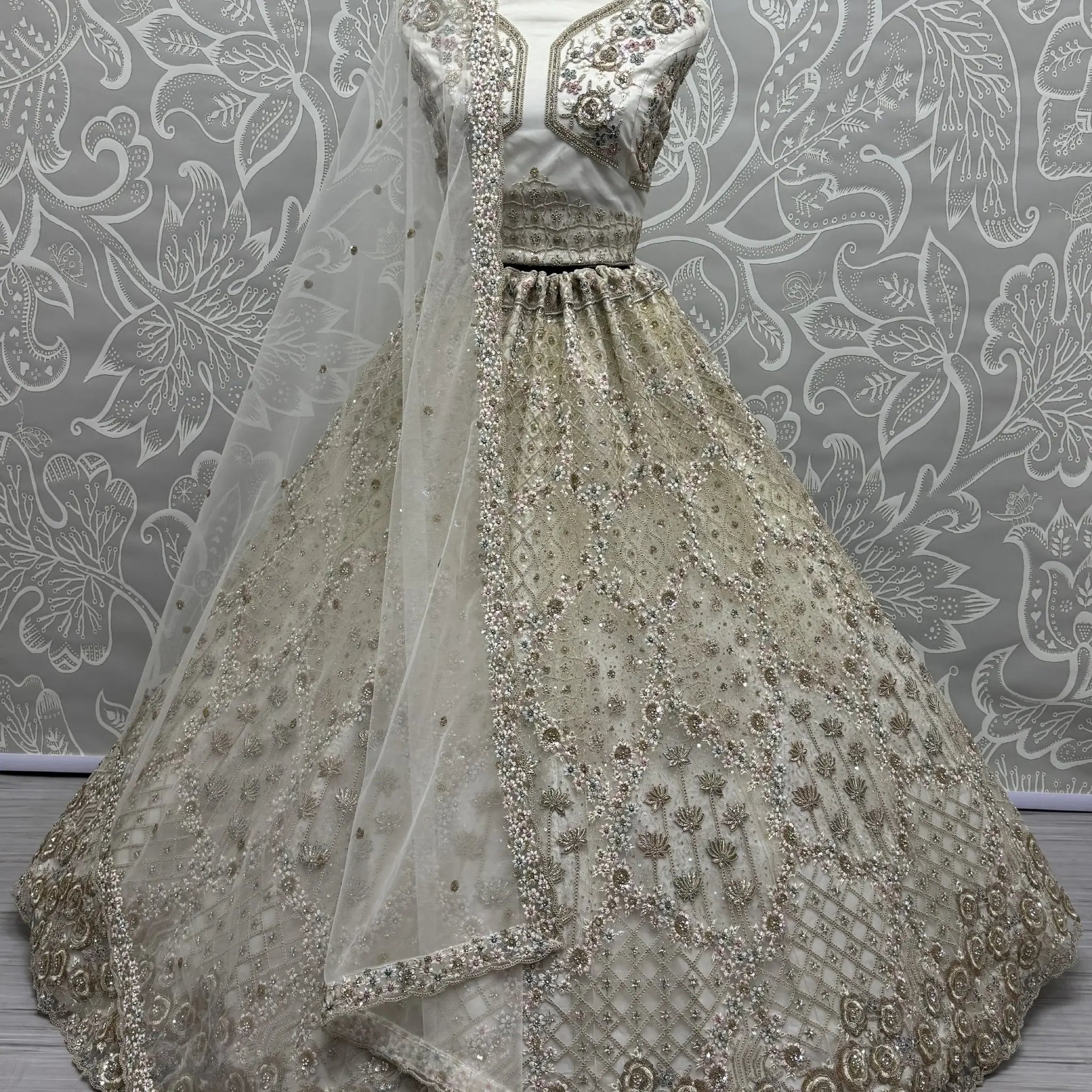 Wonderful Off-White Zirkon Work Net Bridesmaid Lehenga Choli With Dupatta - Zeel Clothing
