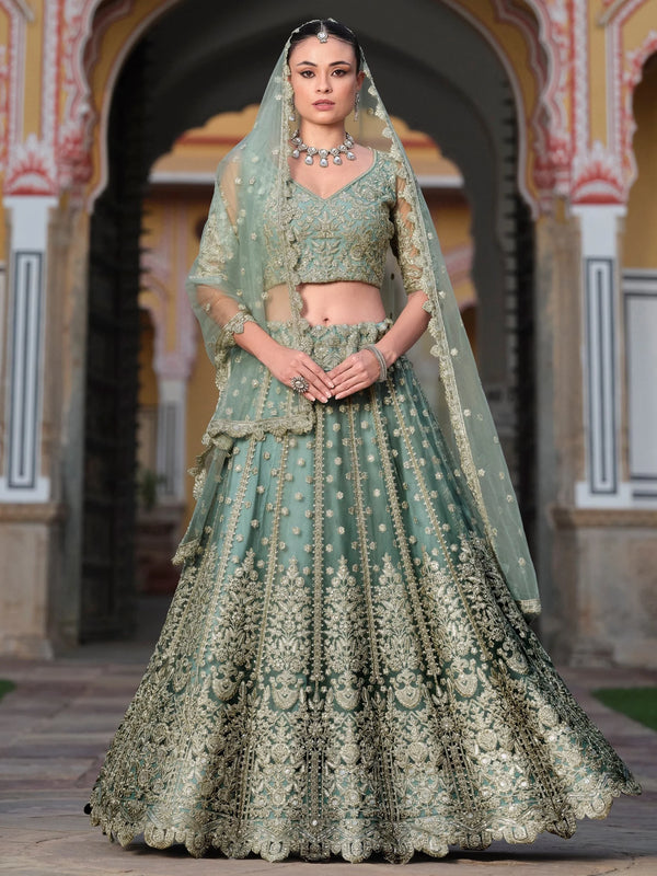 Wonderful Pista Green Embroidered Net Engagement Wear Lehenga Choli