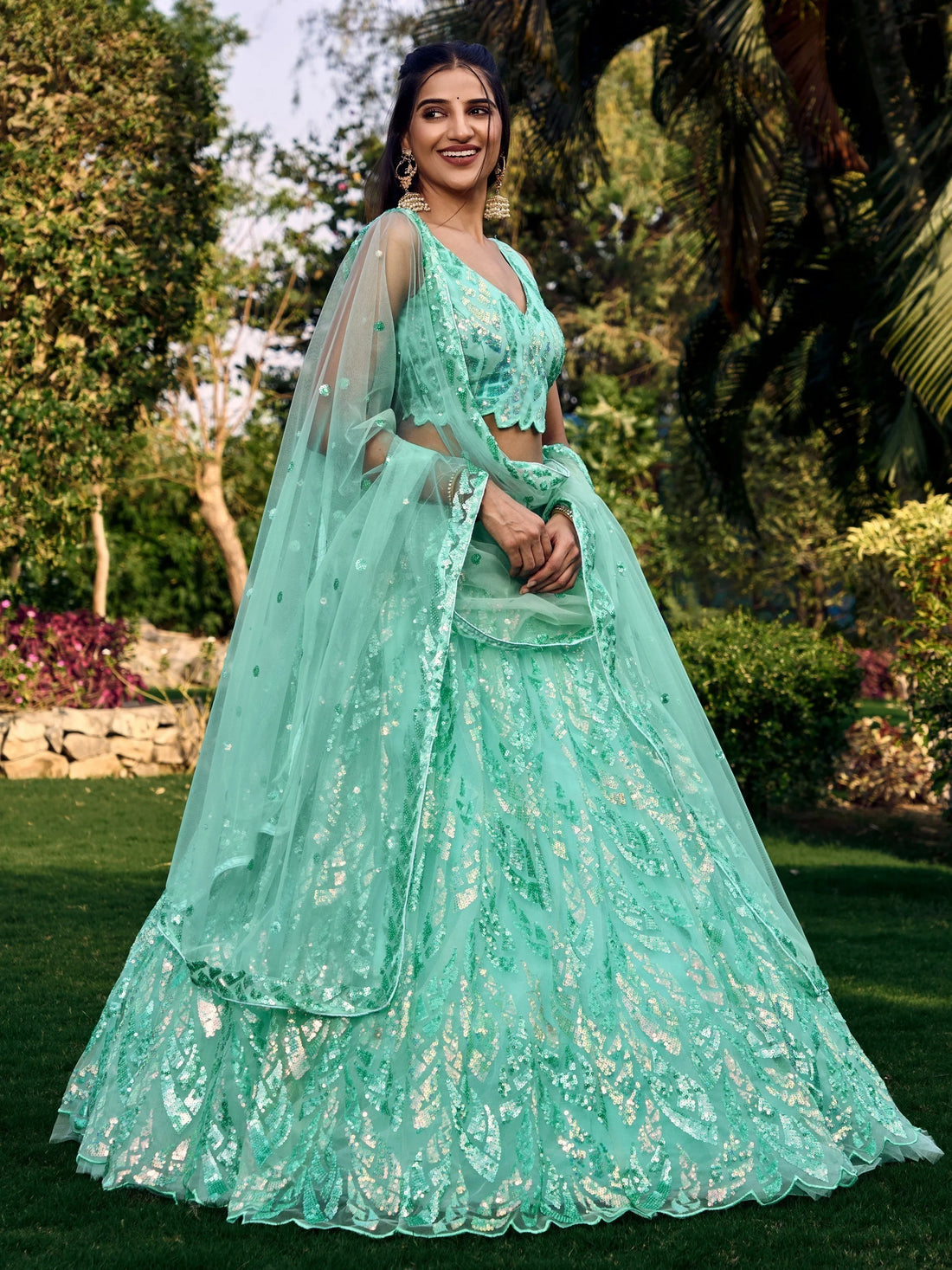 Wonderful Turquoise Sequins Net Reception Wear Lehenga Choli