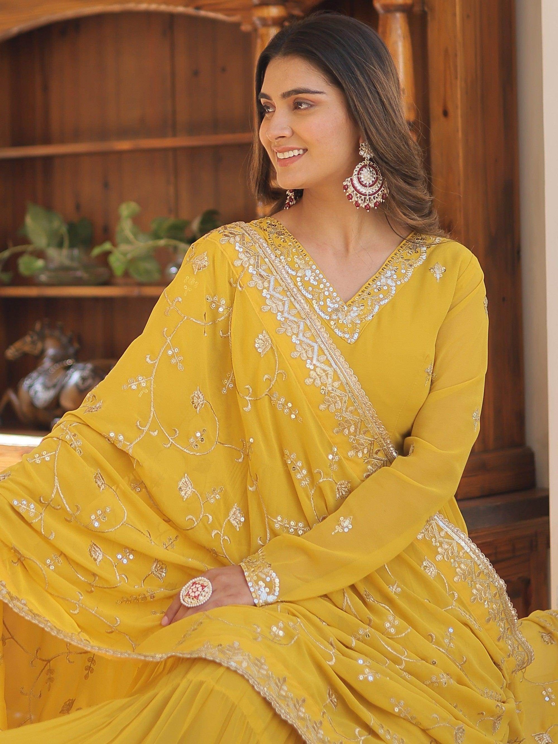 Wonderful Yellow Ruffle Work Georgette Haldi Wear Gown With Dupatta - Zeel Clothing