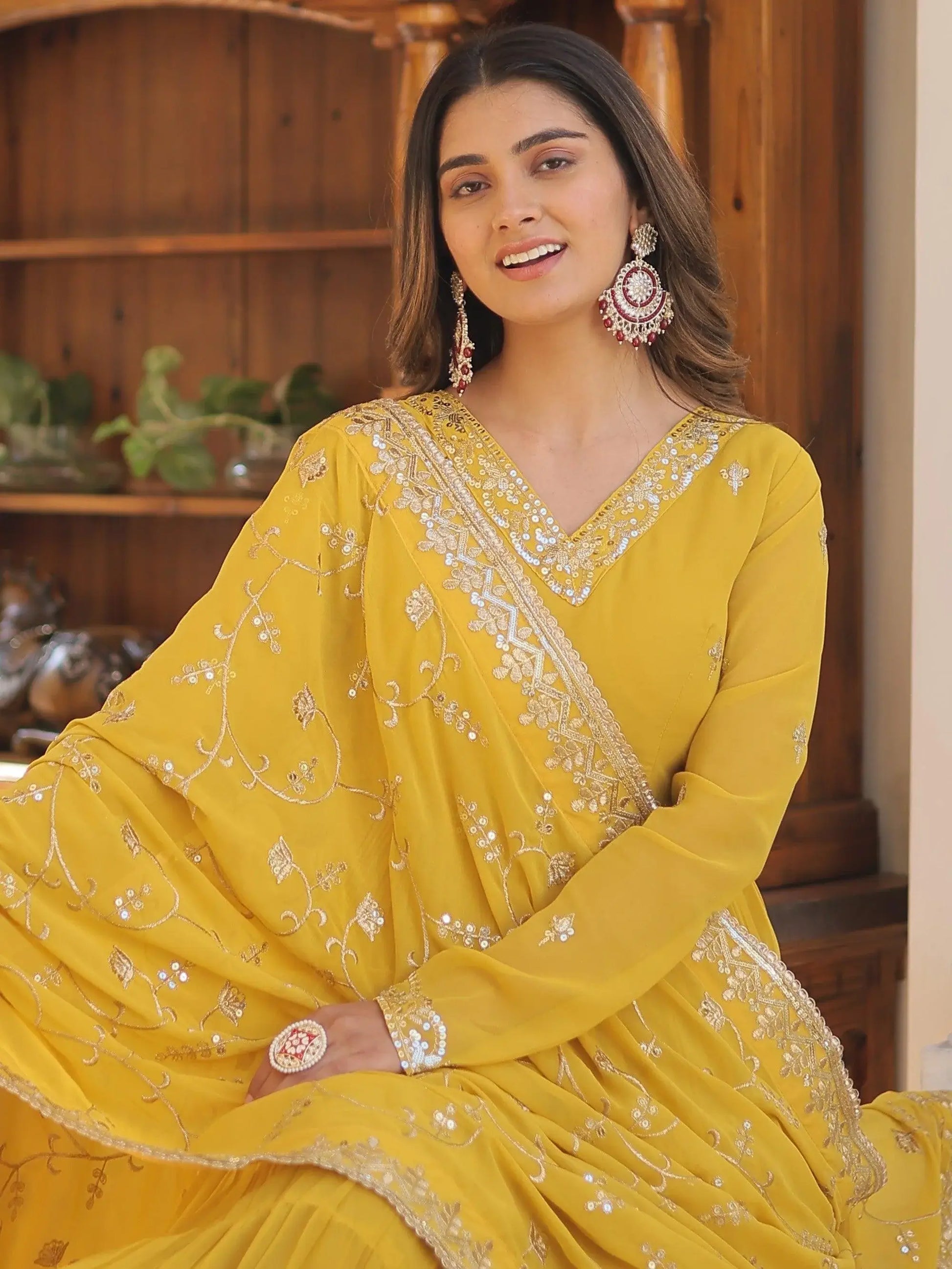 Wonderful Yellow Ruffle Work Georgette Haldi Wear Gown With Dupatta - Zeel Clothing
