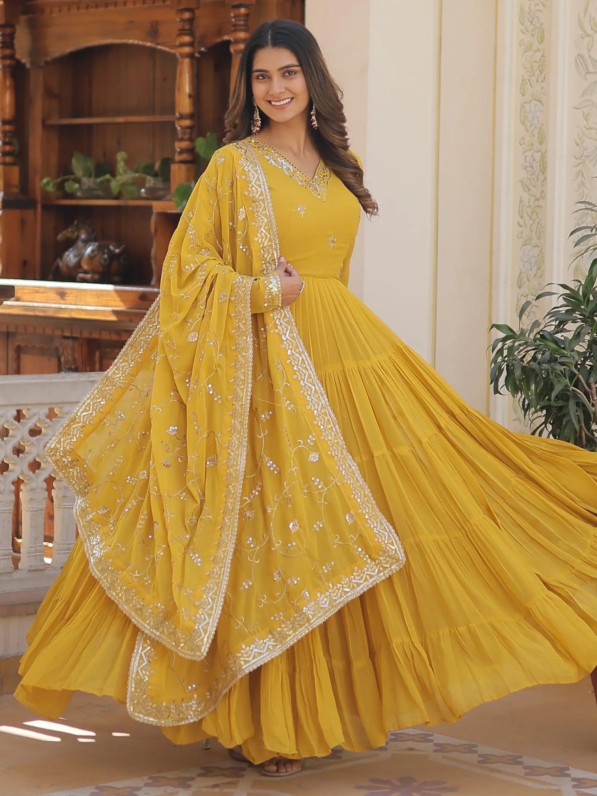 Wonderful Yellow Ruffle Work Georgette Haldi Wear Gown With Dupatta - Zeel Clothing