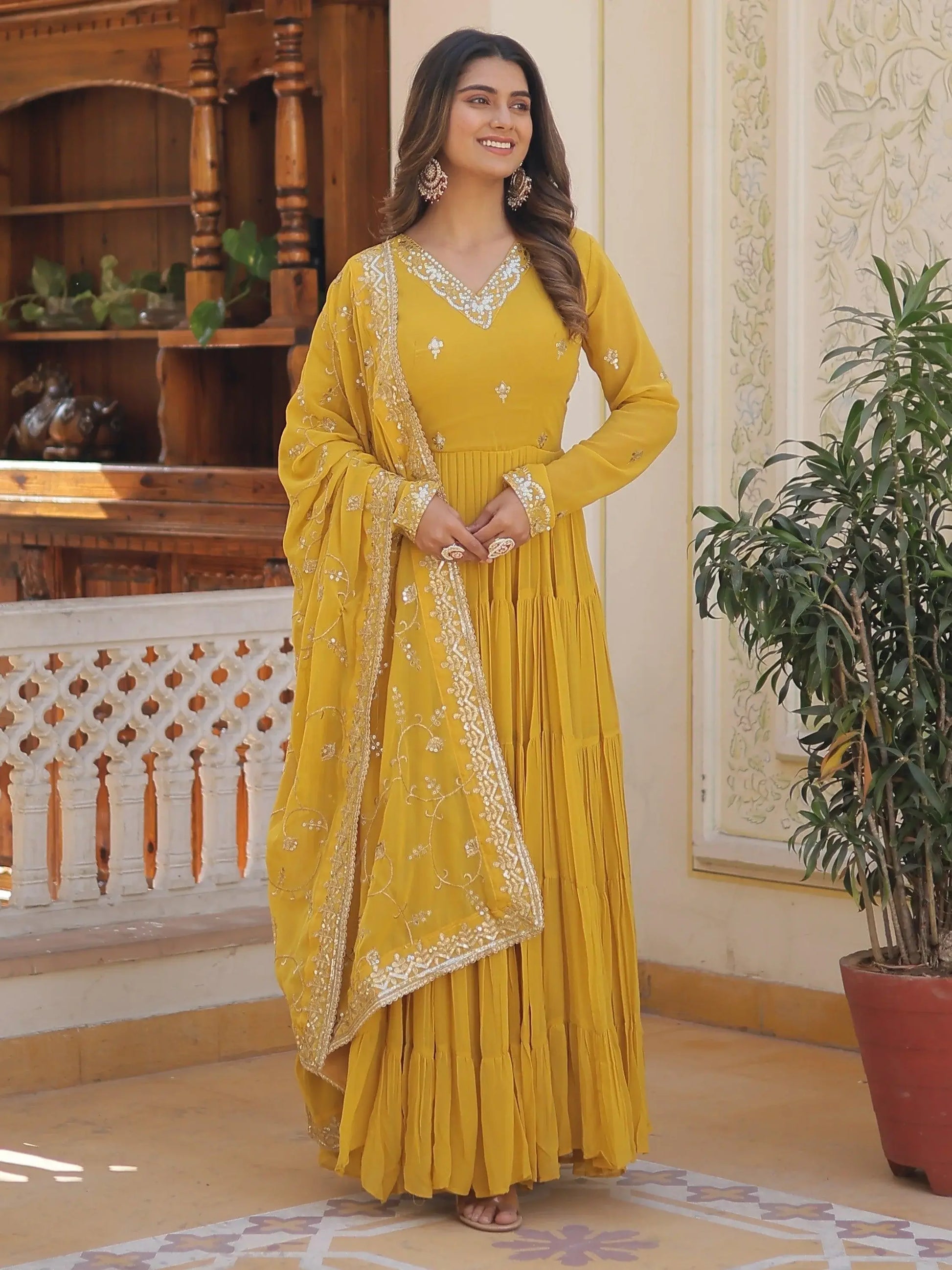 Wonderful Yellow Ruffle Work Georgette Haldi Wear Gown With Dupatta - Zeel Clothing