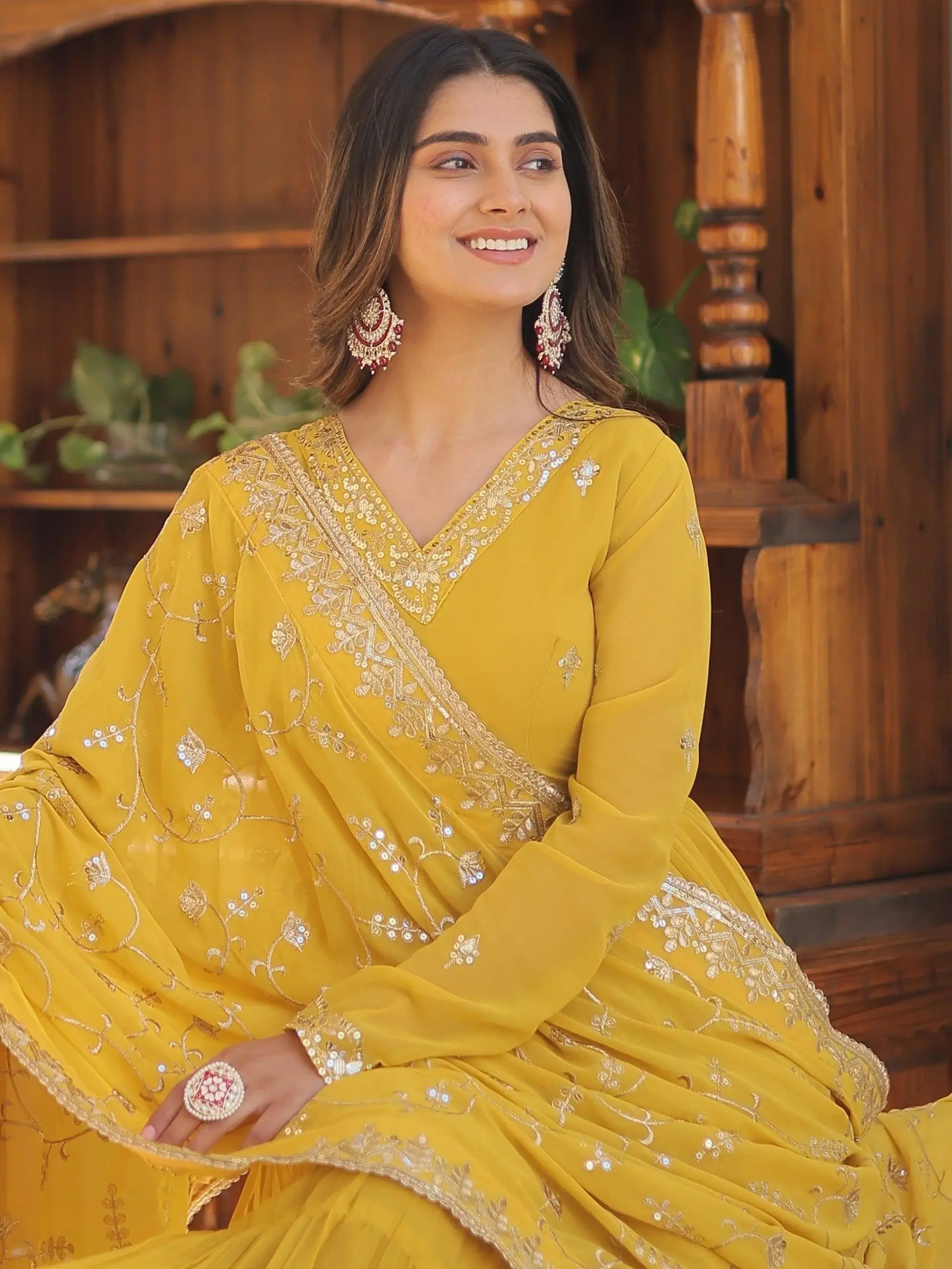 Wonderful Yellow Ruffle Work Georgette Haldi Wear Gown With Dupatta - Zeel Clothing