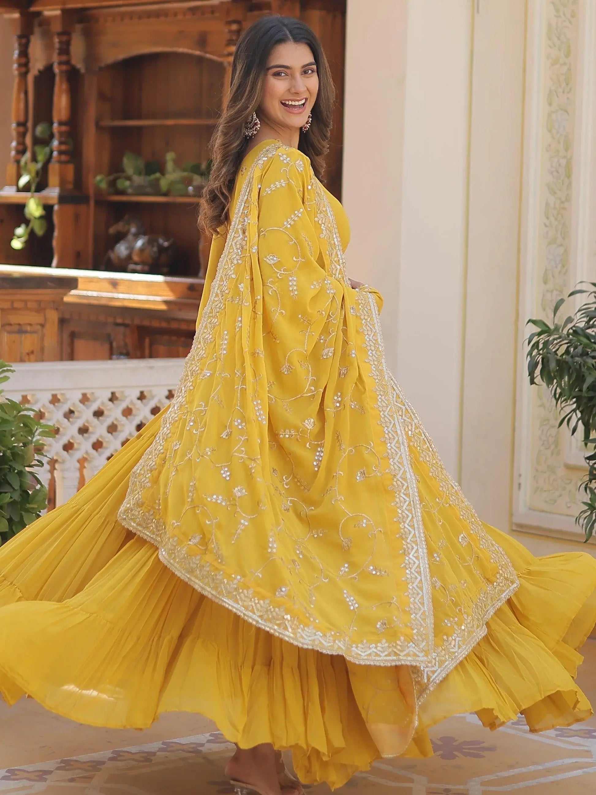 Wonderful Yellow Ruffle Work Georgette Haldi Wear Gown With Dupatta - Zeel Clothing