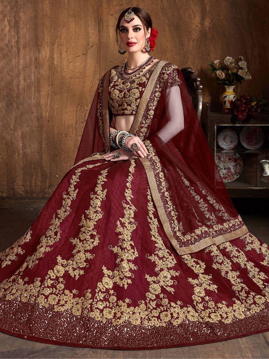 Mesmerizing Maroon Embroidered Raw Silk Lehenga Choli With Dupatta