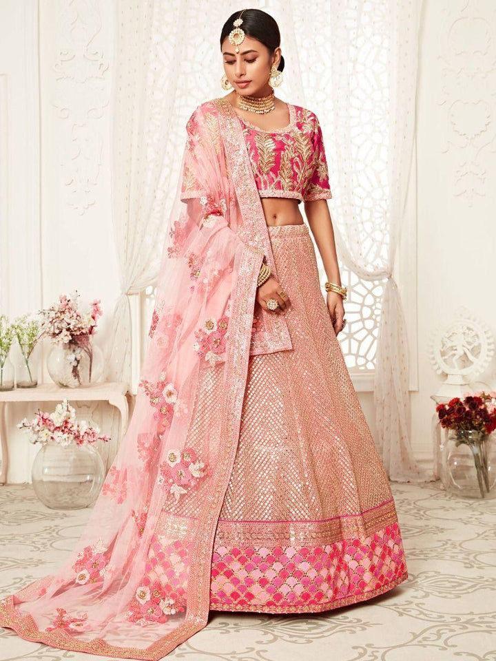 Fascinating Pink Embroidered Soft Net Wedding Wear Lehenga Choli