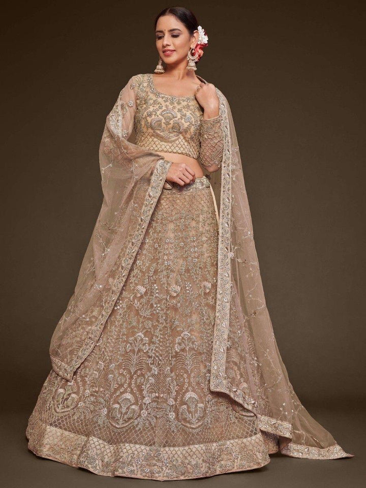 Cute Royal Beige Embroidered Soft Net Engagement Wear Lehenga Choli