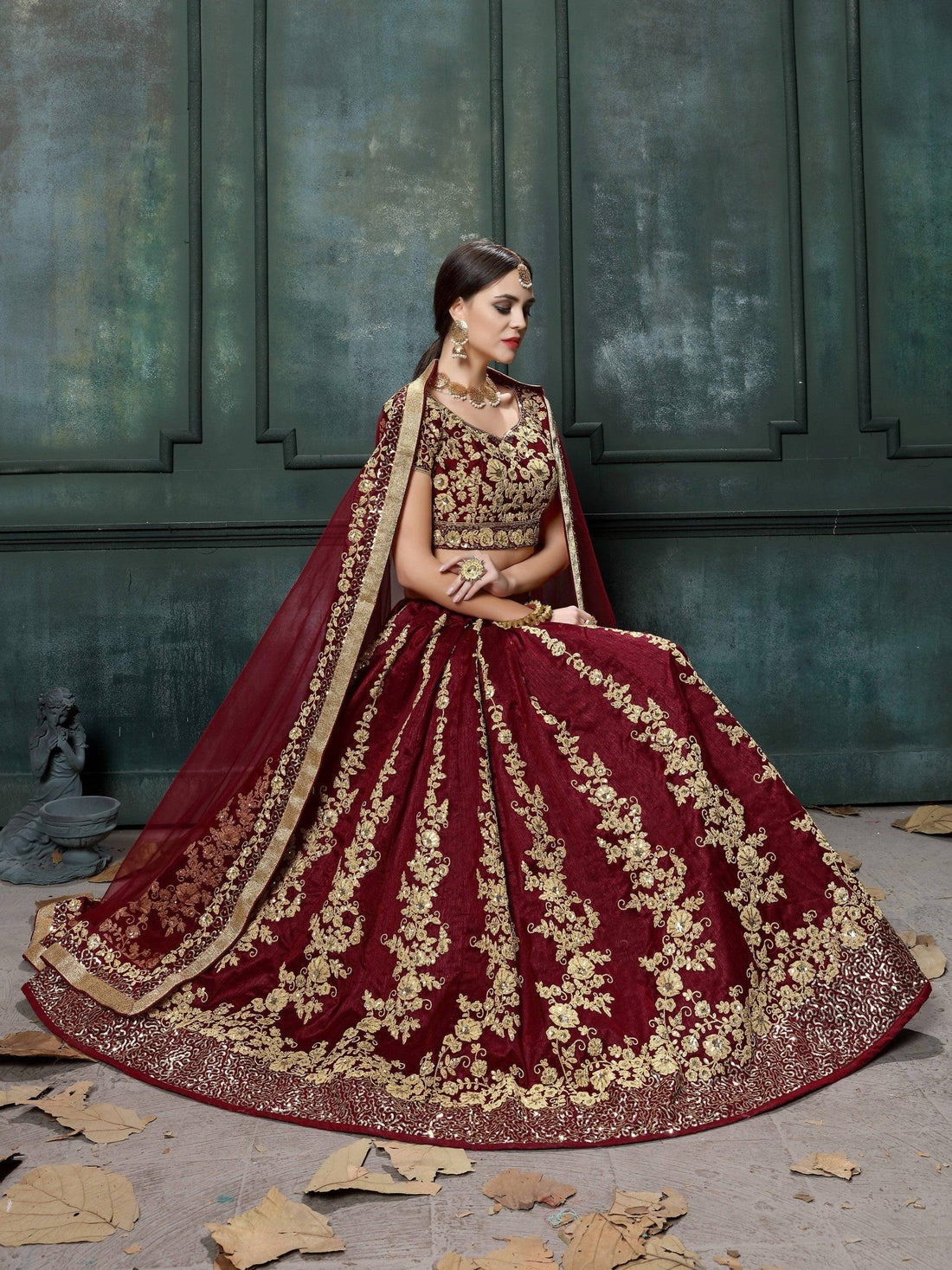 Impressive Maroon Colored Designer Partywear Raw Silk Lehenga Choli