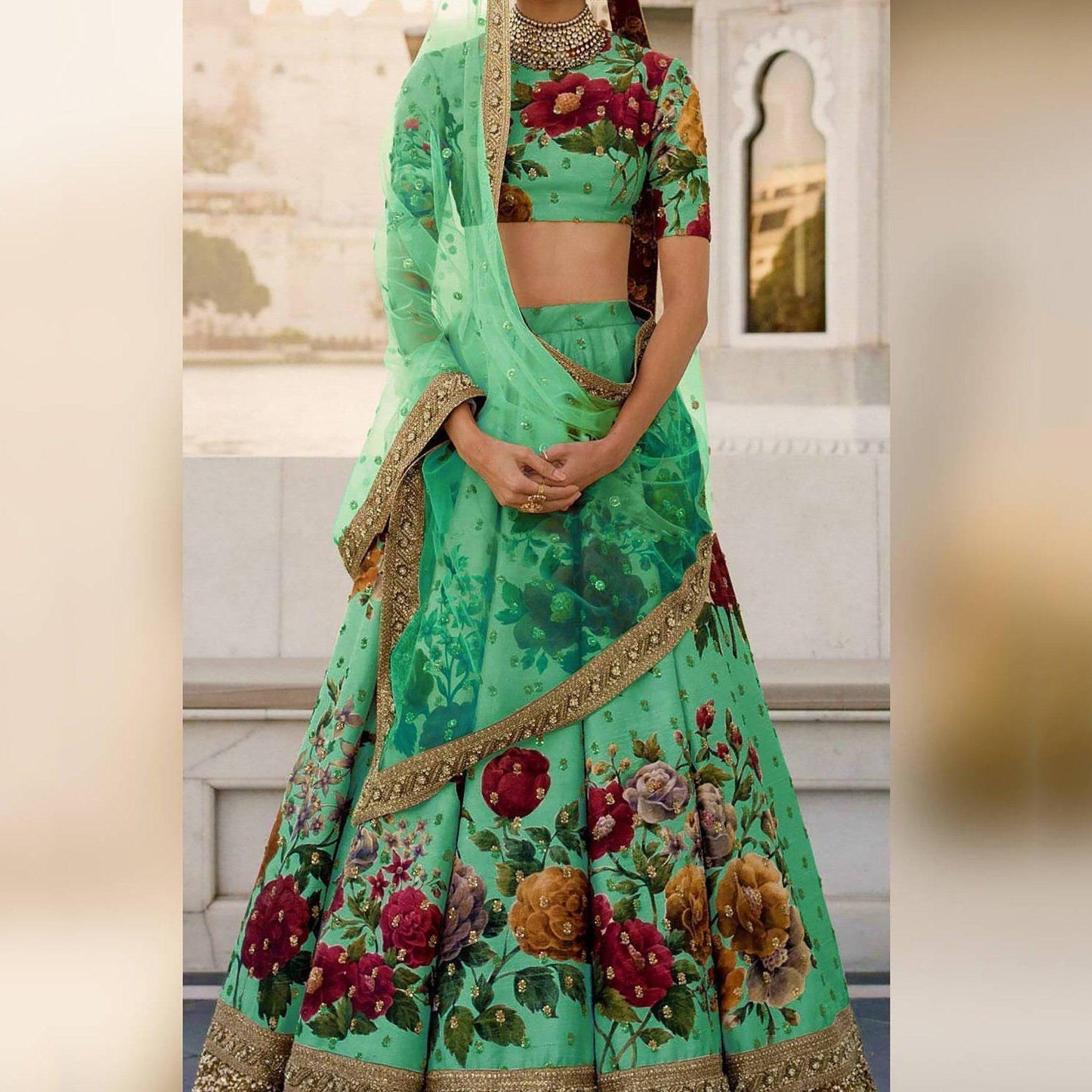 Gorgeous Green Colored Partywear Designer Embroidered Lehenga Choli