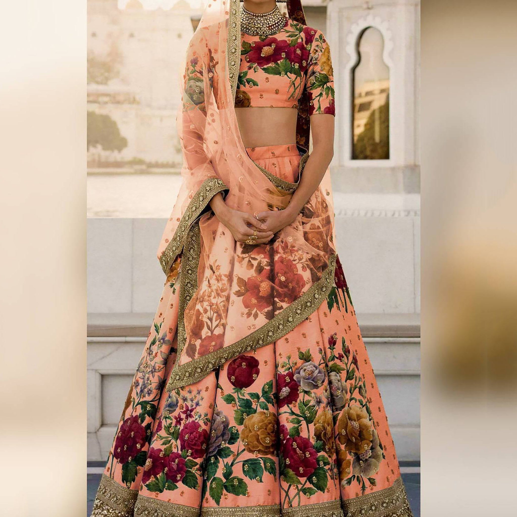 Gorgeous Peach Colored Partywear Designer Embroidered Lehenga Choli