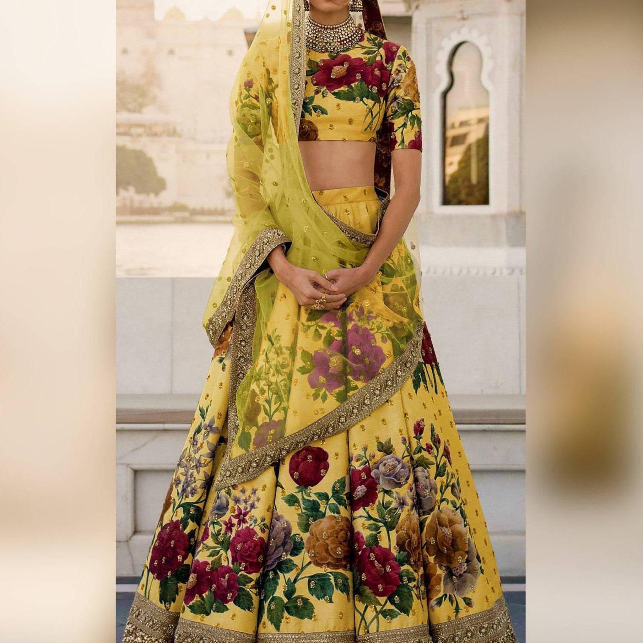 Gorgeous Yellow Colored Partywear Designer Embroidered Lehenga Choli