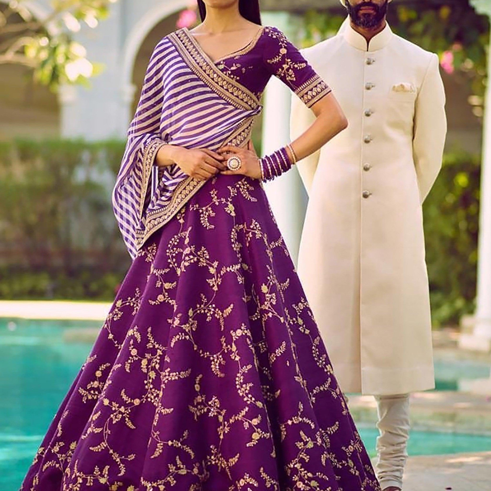 Marvellous Purple Color Bridalwear Embroidered Lehenga Choli
