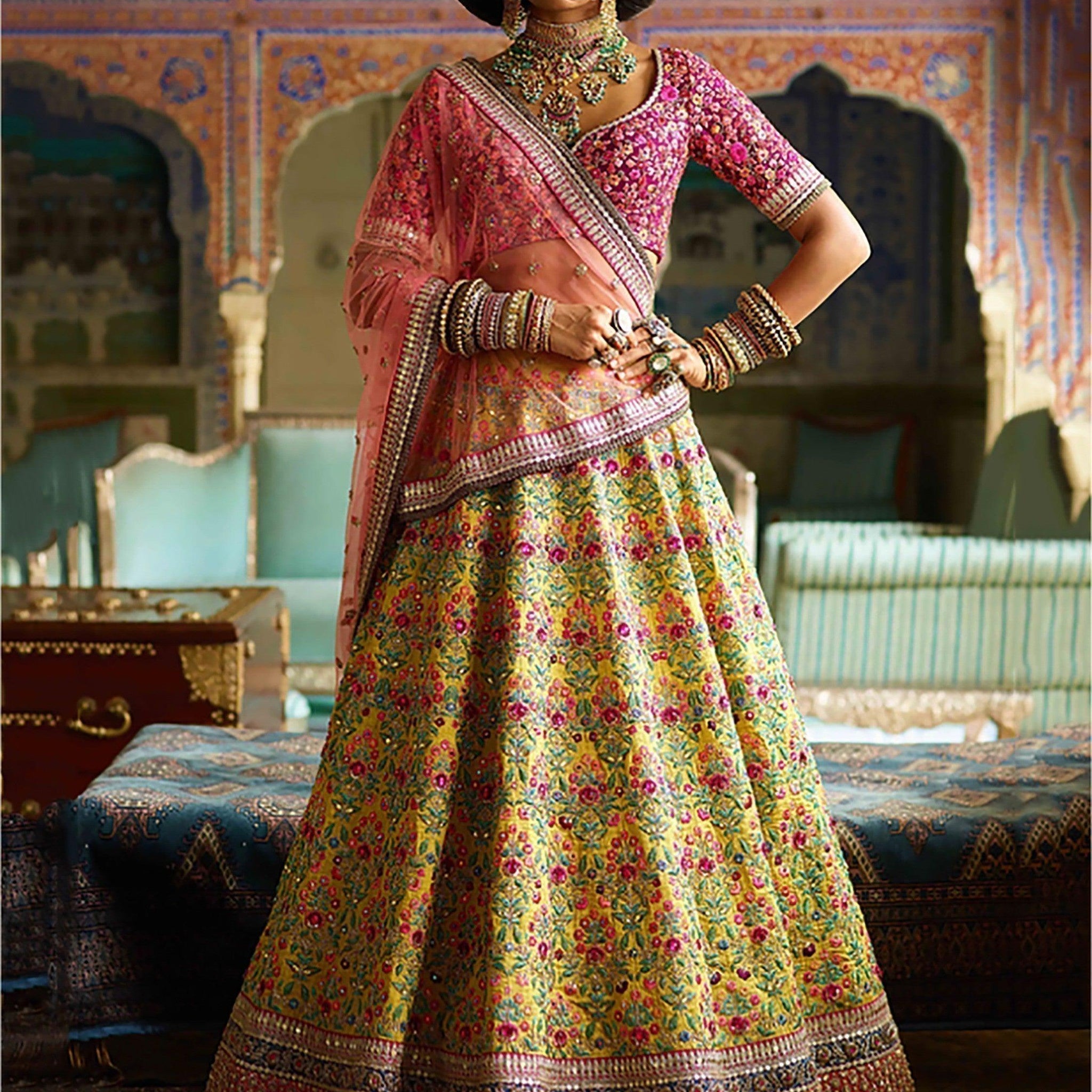 Flamboyant Yellow-Pink Colored Bridal wear Embroidered Lehenga Choli