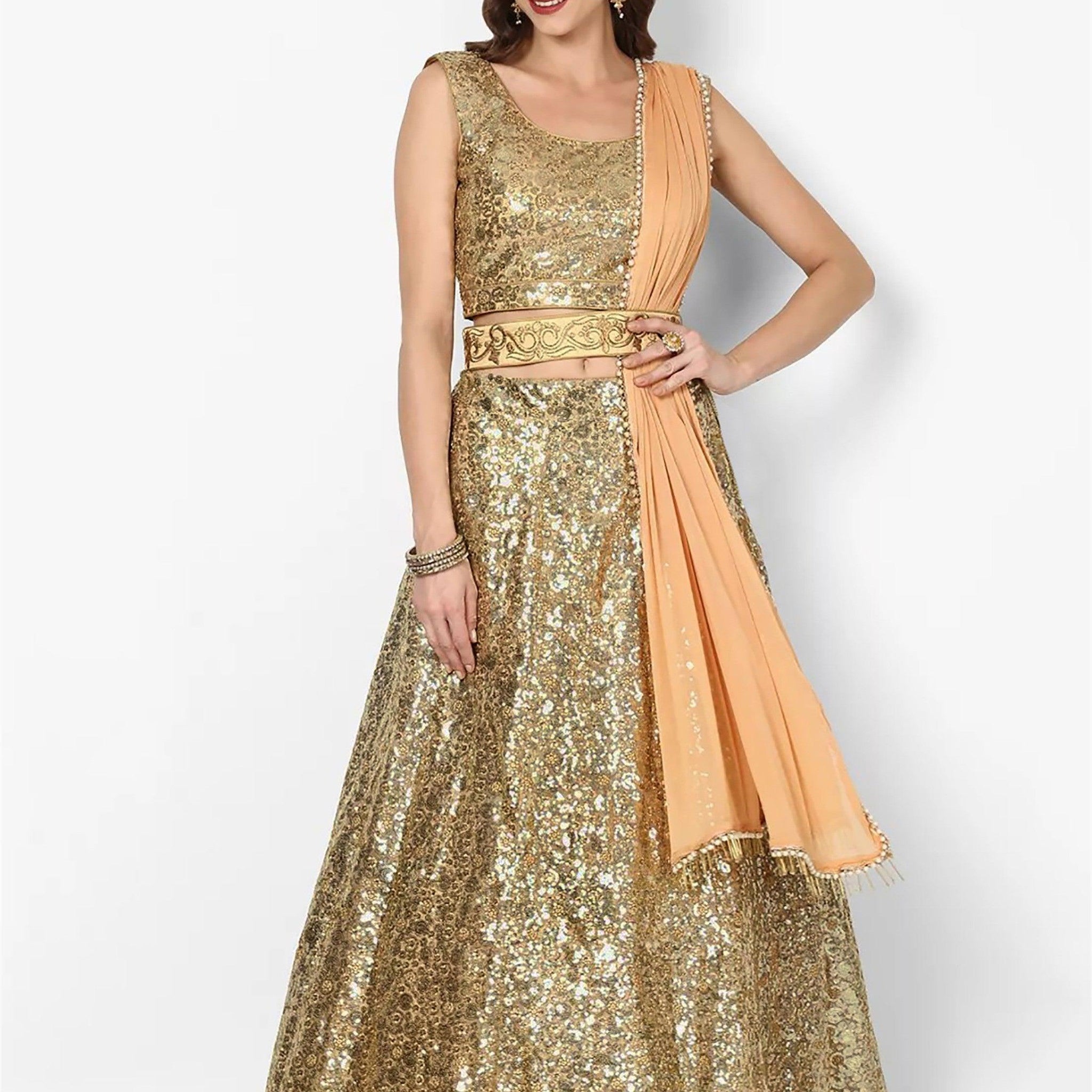 Stunning Golden Colored Party wear Embroidered Netted Lehenga Choli
