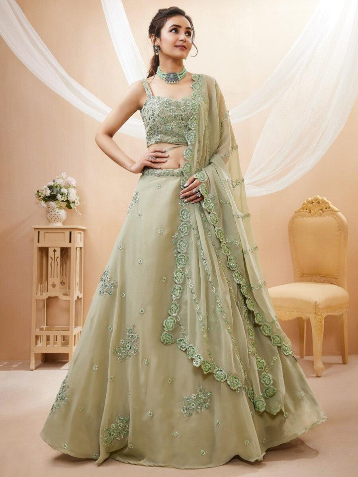 Stunning Pista Green Embroidered Sangeet Wear Lehenga Choli