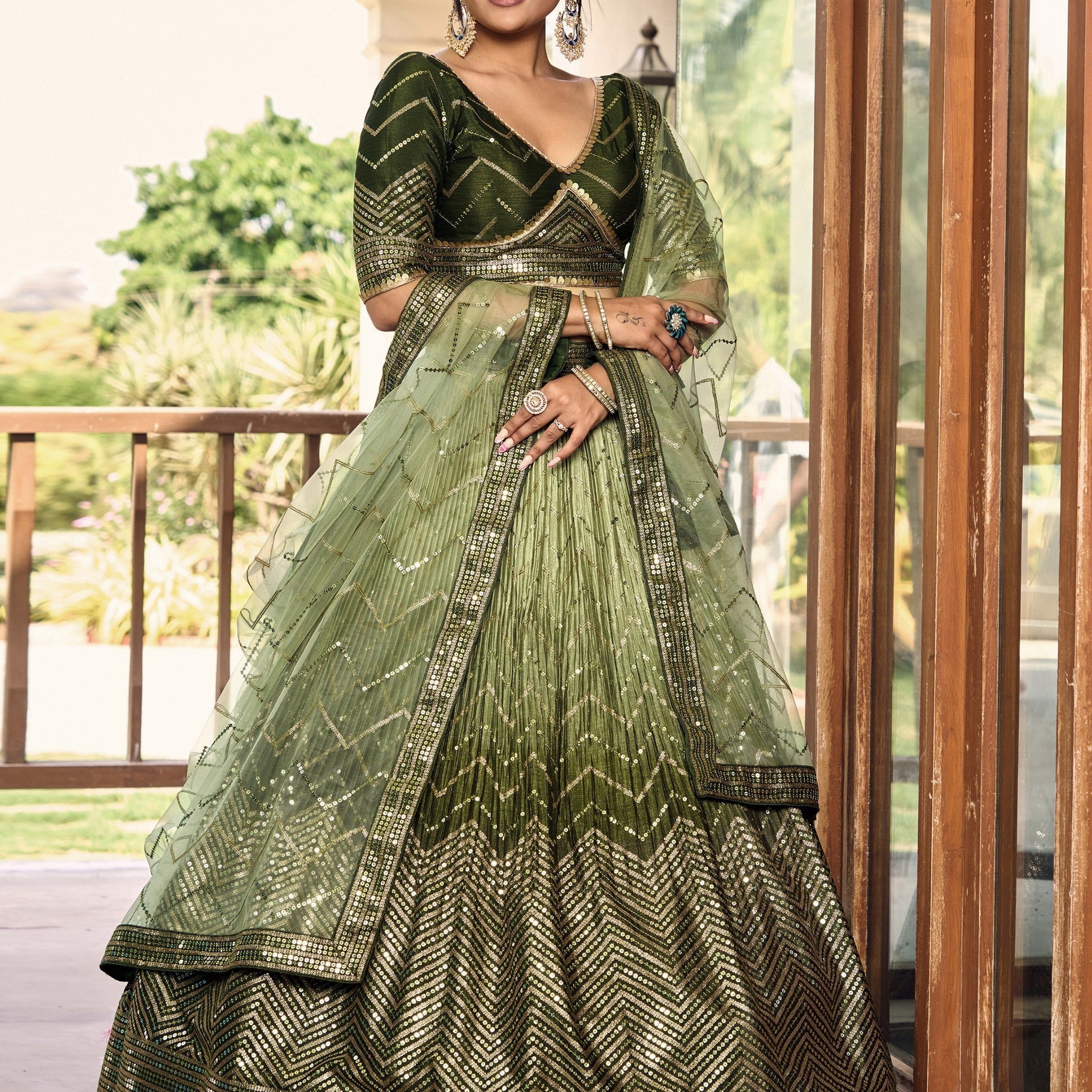 Wonderful Green Sequins Chinon Mehendi Wear Lehenga Choli