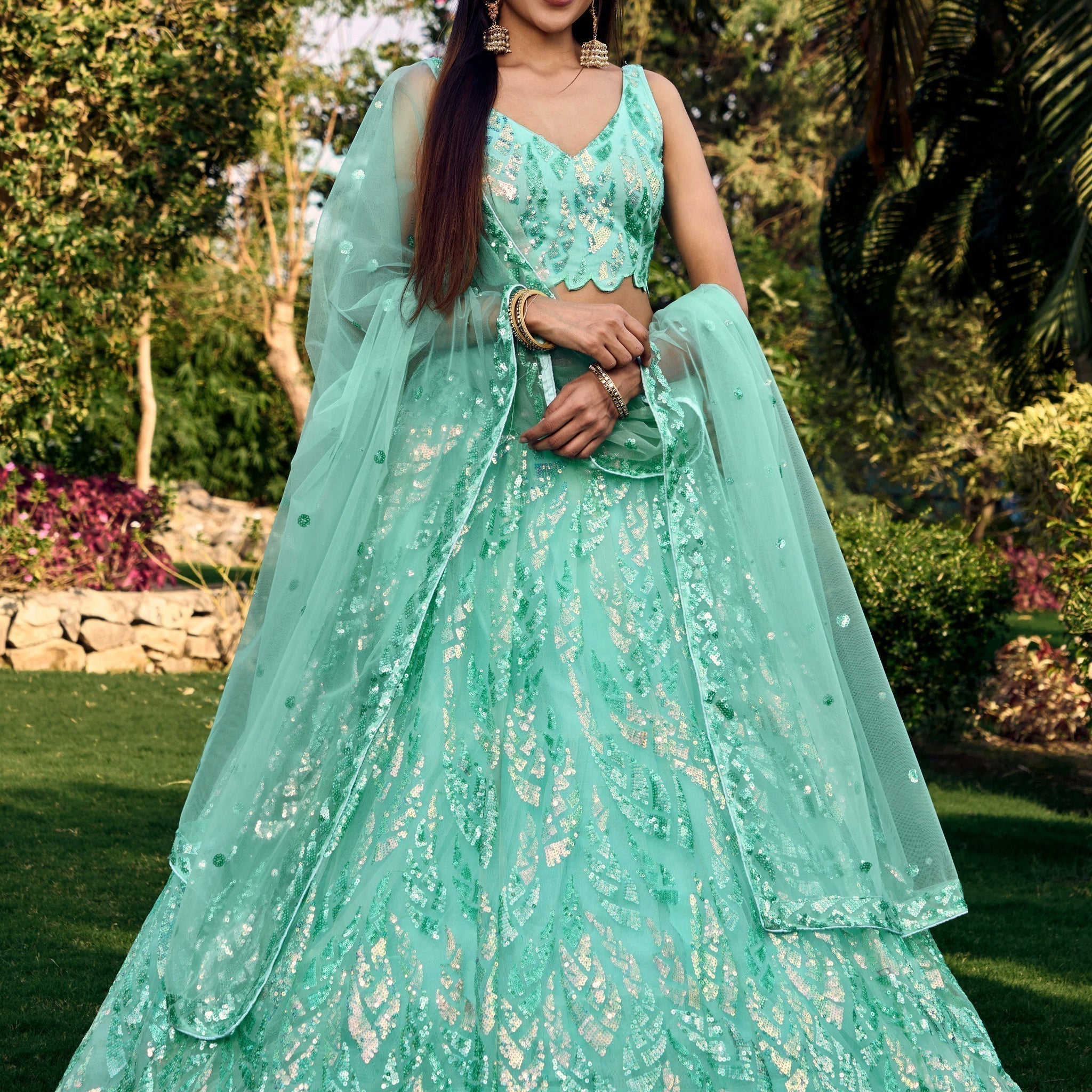 Wonderful Turquoise Sequins Net Reception Wear Lehenga Choli