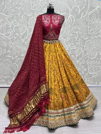 Fabulous Yellow Floral Printed Silk Lehenga Choli With Bandhani Dupatta