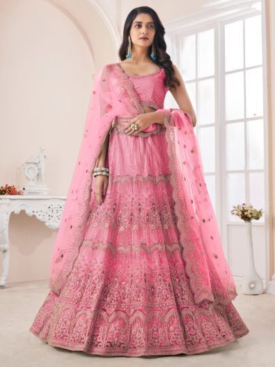 Enchanting Pink Net Sequins Bridal Wear Lehenga Choli With Dupatta