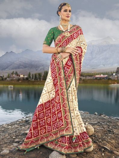 Enticing Cream Bandhani Printed Satin Festive Wear Saree With Blouse