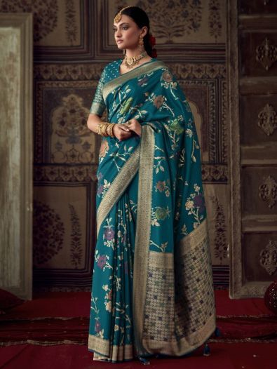 Enchanting Teal Blue Zari Weaving Georgette Saree With Blouse