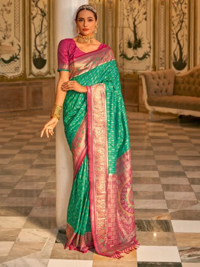Fascinating Teal Green Zari Weaving Banarasi Silk Function Wear Saree
