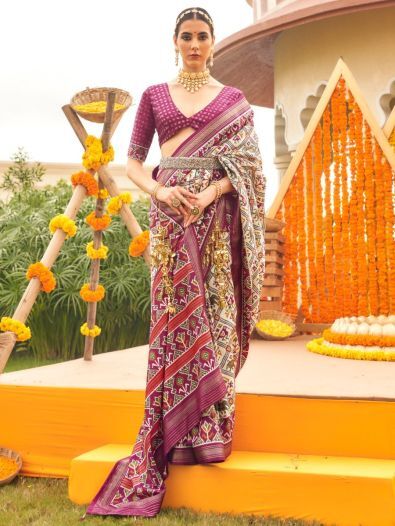 Fabulous Cream & Purple Patola Printed Silk Wedding Wear Saree
