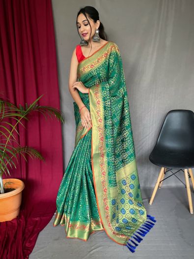Fascinating Green Zari Weaving Patola Silk Saree With Blouse