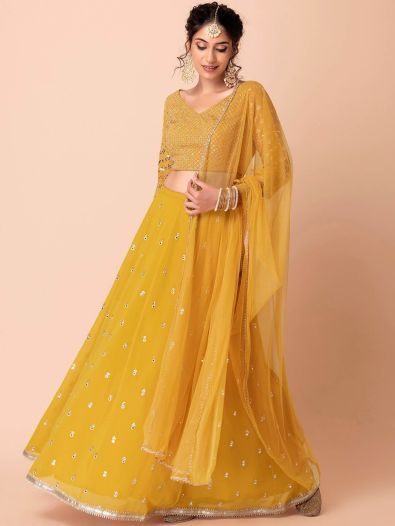 Appealing Yellow Sequins Georgette Haldi Wear Lehenga Choli