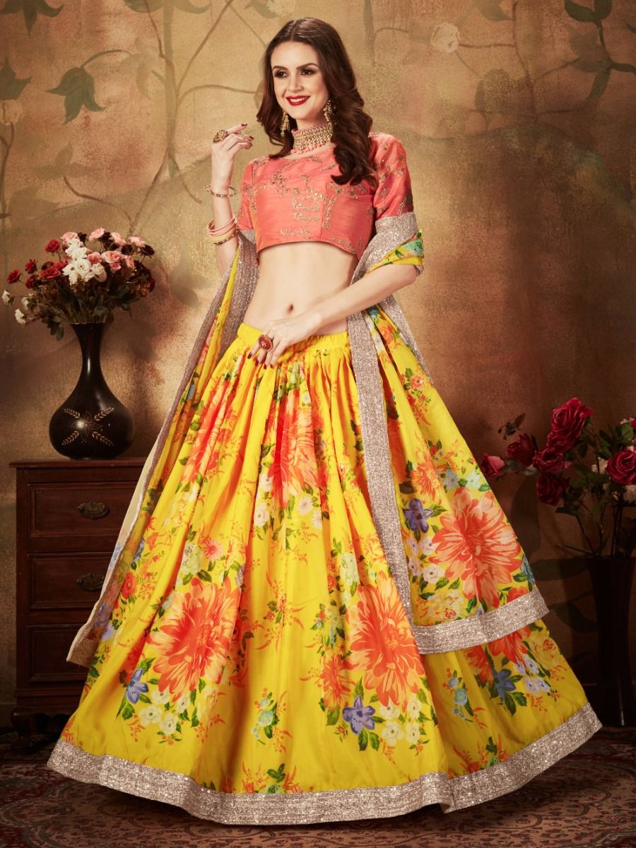 Pretty yellow and green color combination benarasi lehenga and blouse with  net dupatta. Blouse with hand