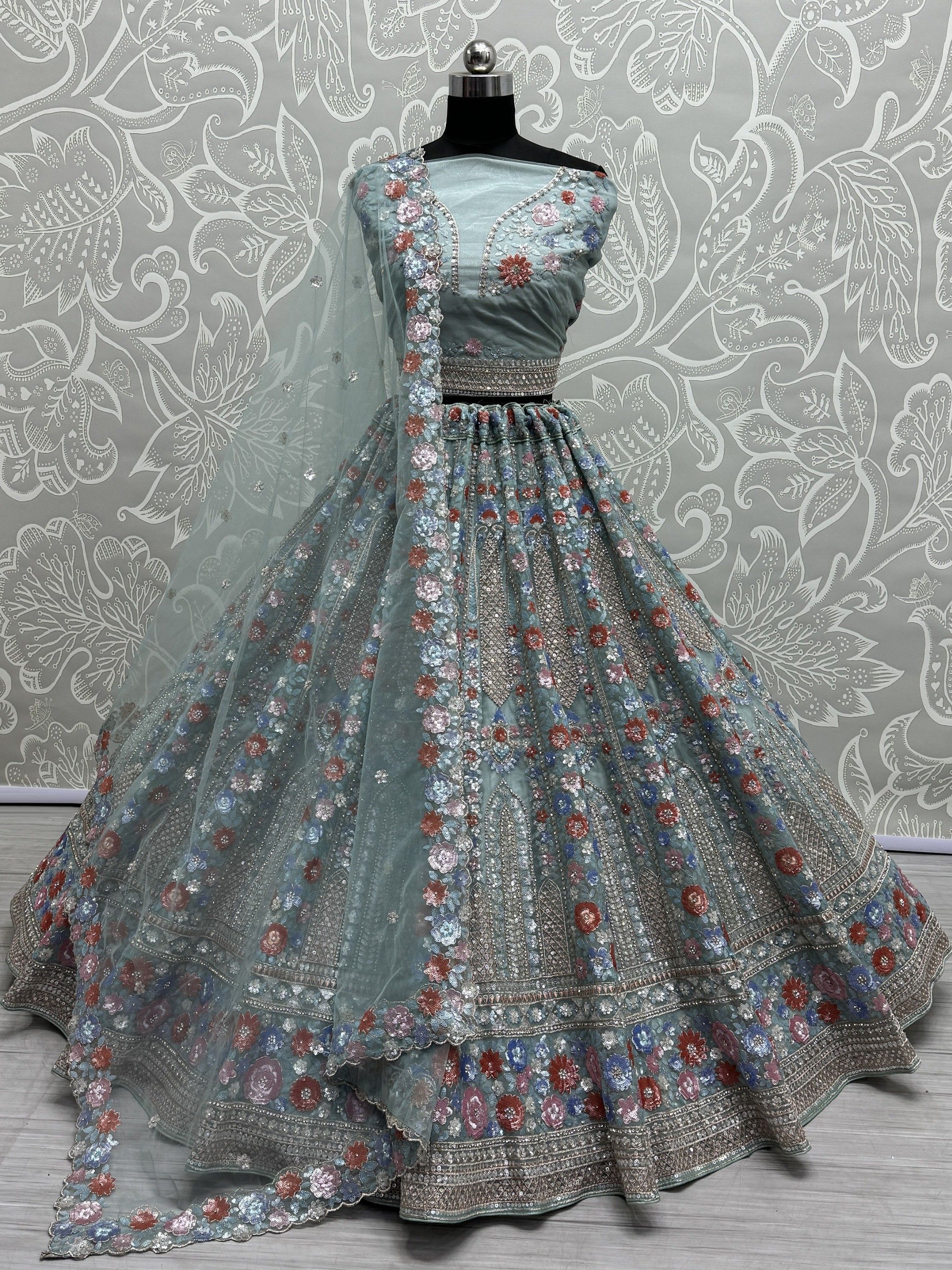 Wonderful Sky-Blue Sequins Net Bridesmaid Lehenga Choli With Dupatta
