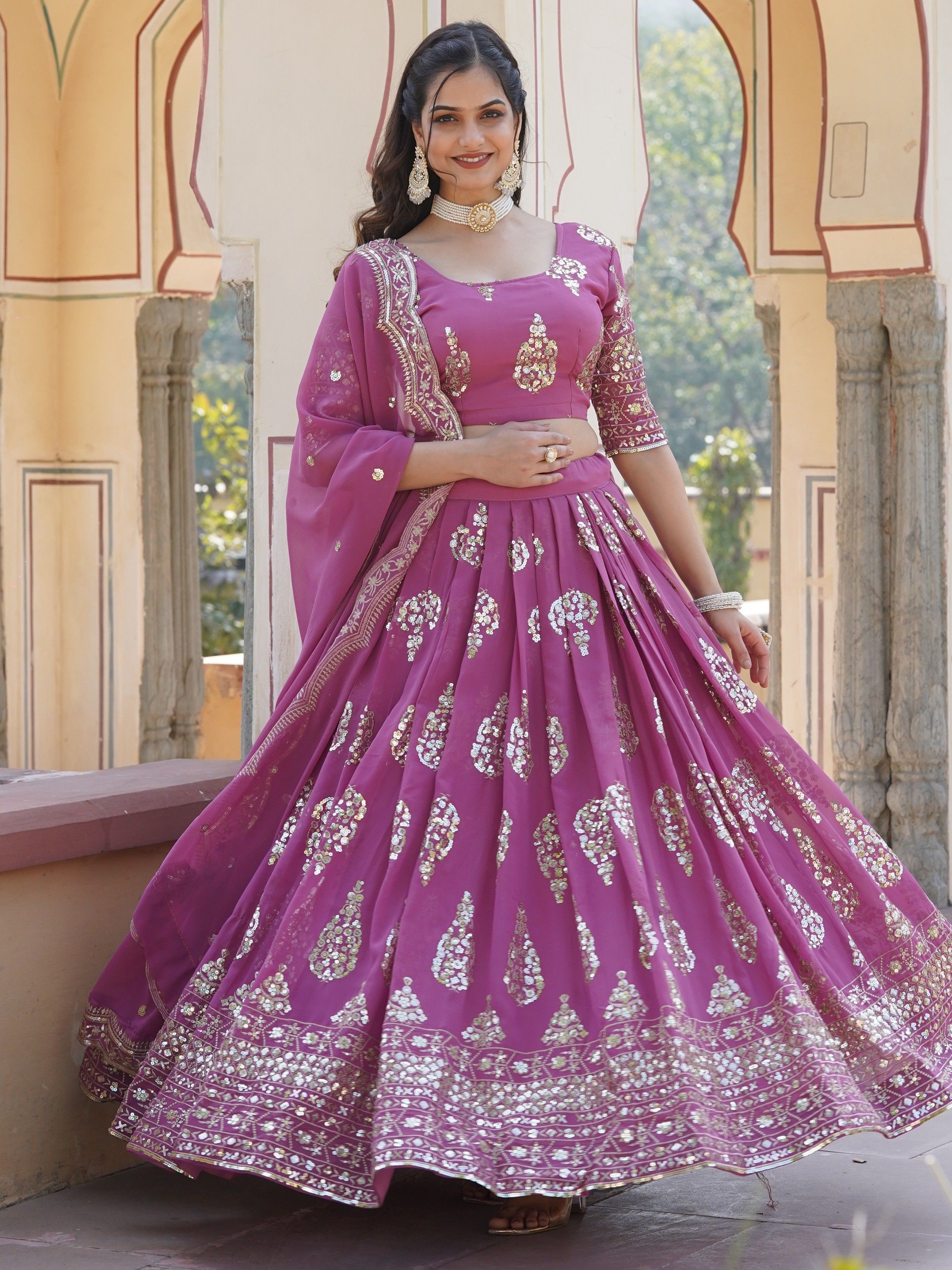 Attractive Purple Sequins Georgette Wedding Wear Lehenga Choli