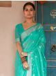 Fascinating Teal Green Embroidered Linen Event Wear Saree