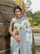 Exquisite Off White Weaving Banarasi Silk Festival Wear Saree