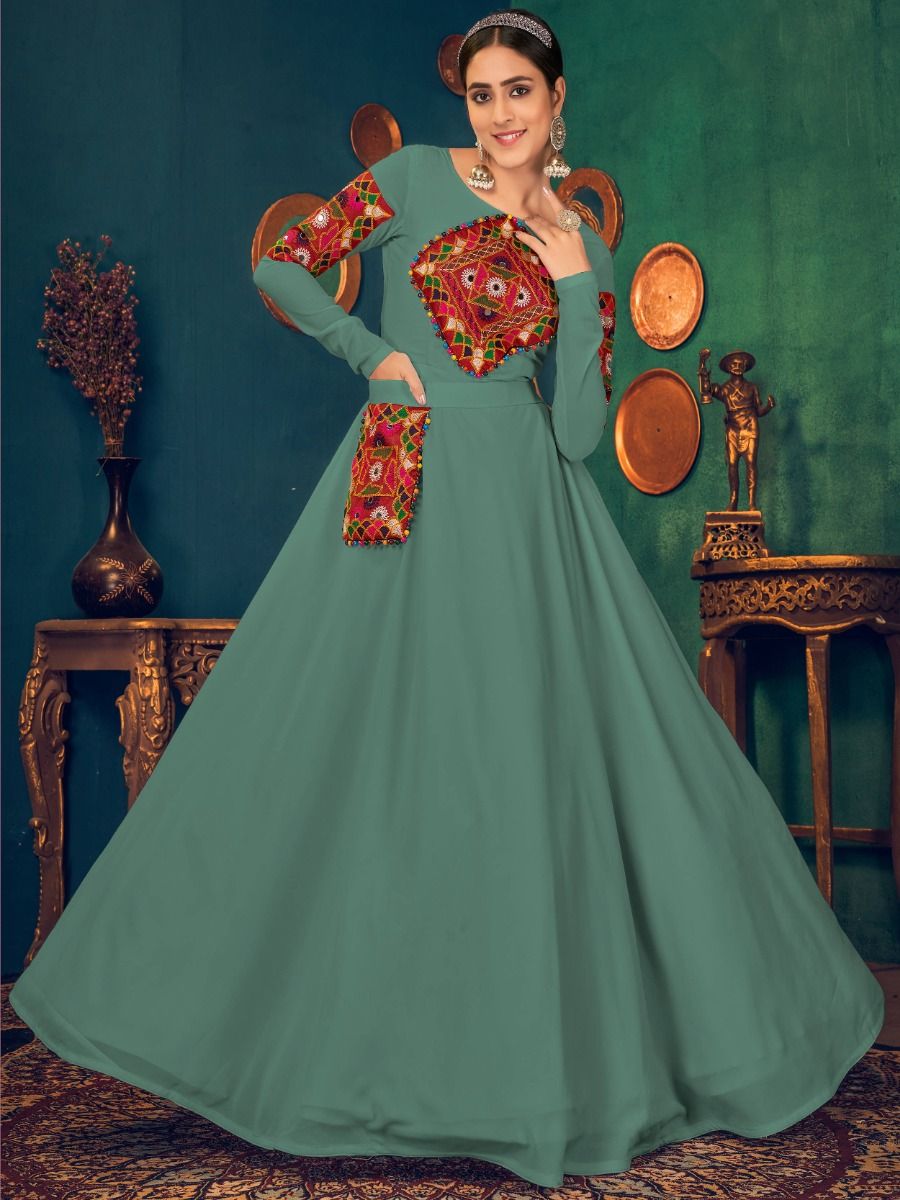Adorable Pista Green Pearl And Mirror Georgette Festive Gown