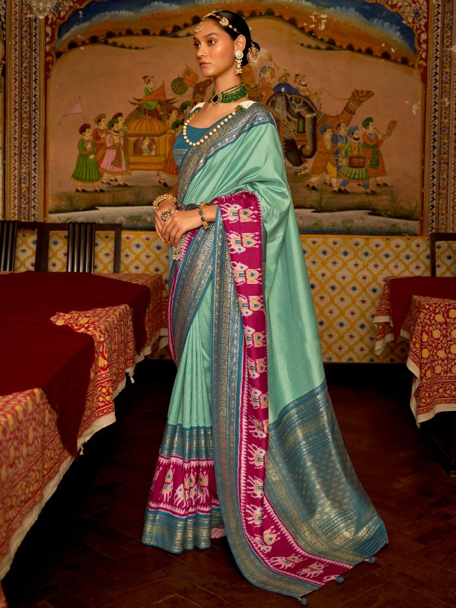 Satisfying Aqua Green Patola Silk Wedding Wear Saree
