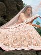 Glamorous Peach Sequins Net Engagement Wear Lehenga Choli With Dupatta