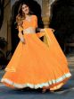 Enchanting Orange Laheriya Print Georgette Designer Lehenga Choli