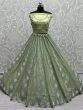 Attractive Pista Green Sequins Net Engagement Wear Lehenga Choli 