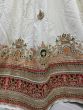 Dazzling White Thread-Work Silk Wedding Wear Lehenga Choli