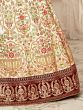 Enchanting Off White Embroidered Silk Wedding Wear Lehenga Choli