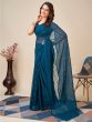 Awesome Teal Blue Sequins Georgette Function Wear Saree With Blouse