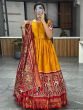 Captivating Mustard Yellow Patola Print Silk Gown With Dupatta