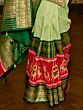 Pleasant Pista Green Patola Silk Wedding Wear Saree