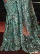 Marvelous Sea Green Sequins Net Designer Saree With Blouse