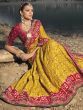Fascinating Yellow Bandhani Printed Satin Reception Wear Saree With Blouse