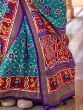 Fascinating Teal Blue Patola Printed Silk Traditional Saree 