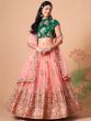 Glamorous Peach Mirror Work Net Wedding Wear Lehenga Choli